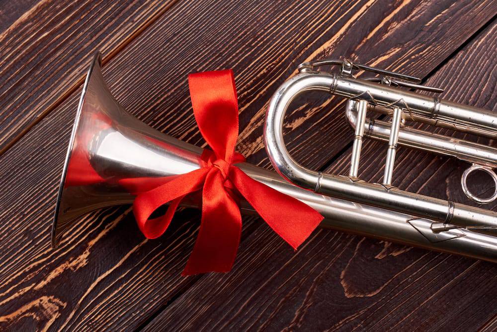 Trumpet wrapped with a holiday bow