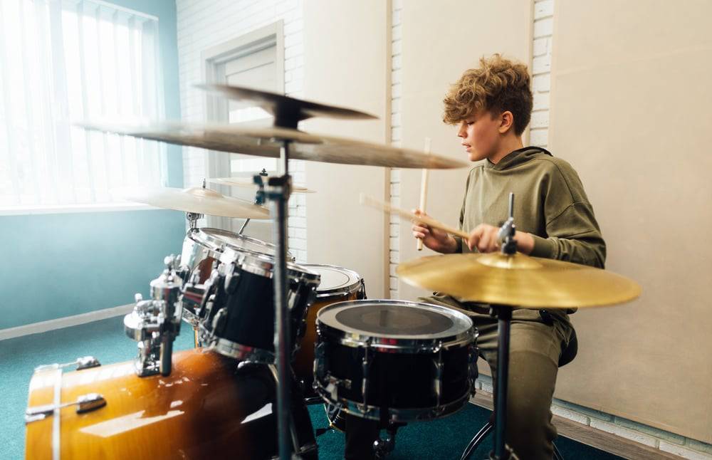 Young drummer practicing 